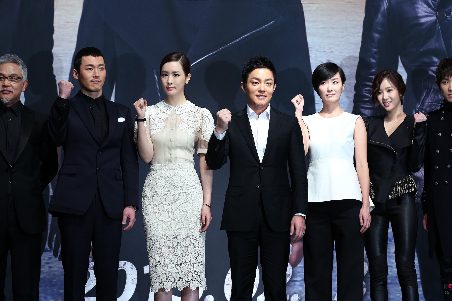 A drama cast lined up at a press conference